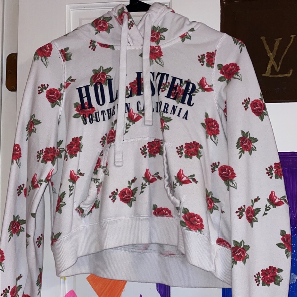 A Hollister cropped hoodie with Red flowers